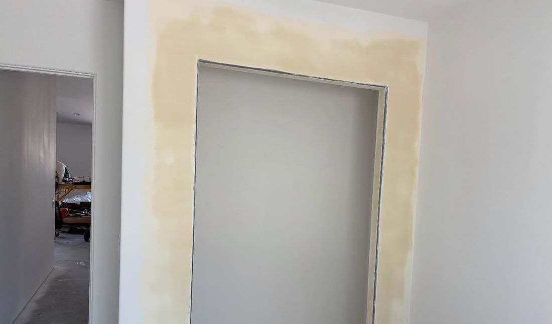 Drywall opening taped and finished, ready for paint
